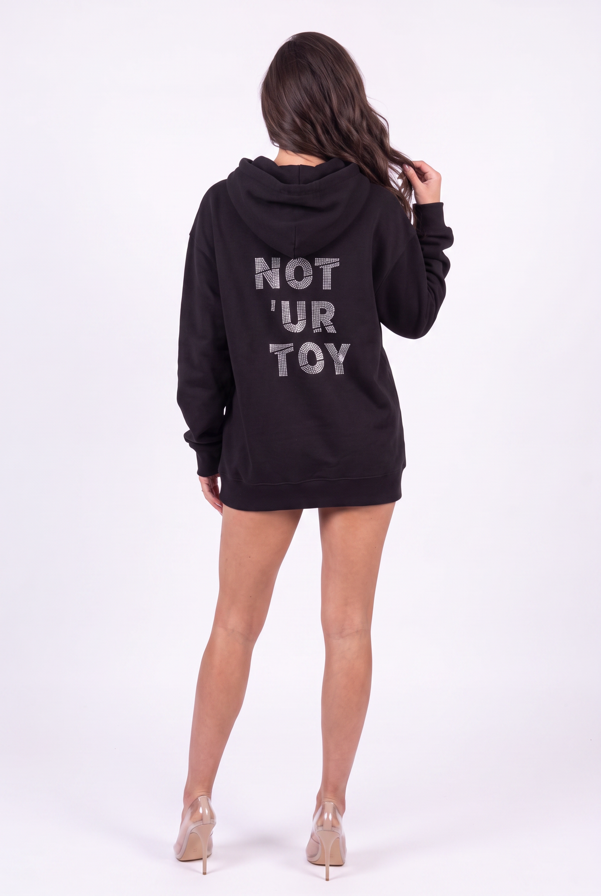 Back view of the Girl Code black hoodie showing NOT 'UR TOY spelled in crystal rhinestones across the back