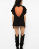 Model wearing Girl Code black heart cutout oversized t-shirt, front view