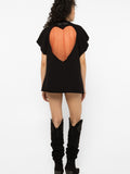 Model wearing Girl Code black heart cutout oversized t-shirt, front view