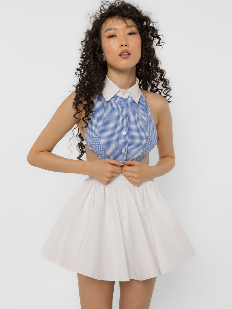 Model wearing Girl Code blue gingham shirt halter crop top with white collar