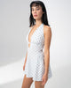 Side view of the Girl Code blue polka dot halter dress showing the fitted bodice and flared skirt
