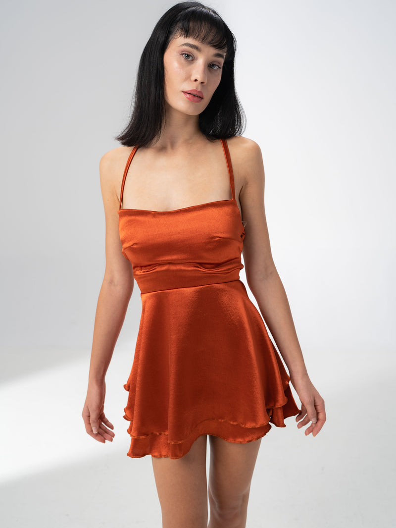 Girl Code burnt orange satin backless mini dress with a straight neckline