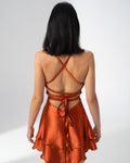 Girl Code burnt orange satin backless mini dress in a deep brick copper shade