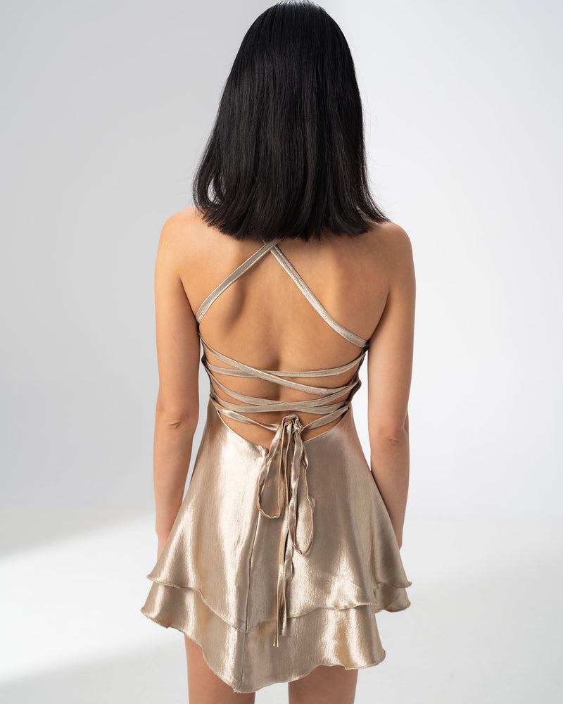 Girl Code champagne satin backless mini dress with crossed straps at the back