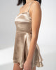 Girl Code champagne satin backless mini dress with a two layer ruffled skirt