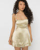 Tiered flared skirt of the champagne satin strappy back mini dress