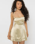 Tiered flared skirt of the champagne satin strappy back mini dress