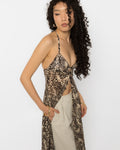 Deep V halter neckline of the leopard print long shirt, triangle bust panels and thin ties