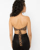 Self-tie back fastening of the Girl Code leopard print strapless top