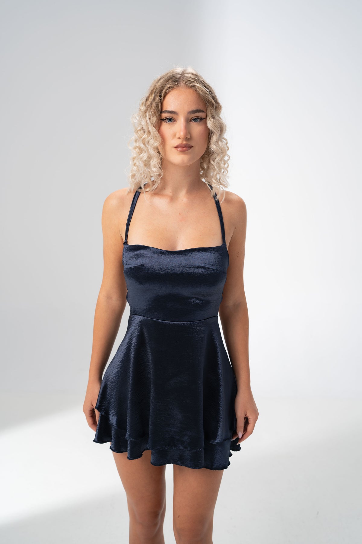 Girl Code navy satin backless mini dress with a straight neckline