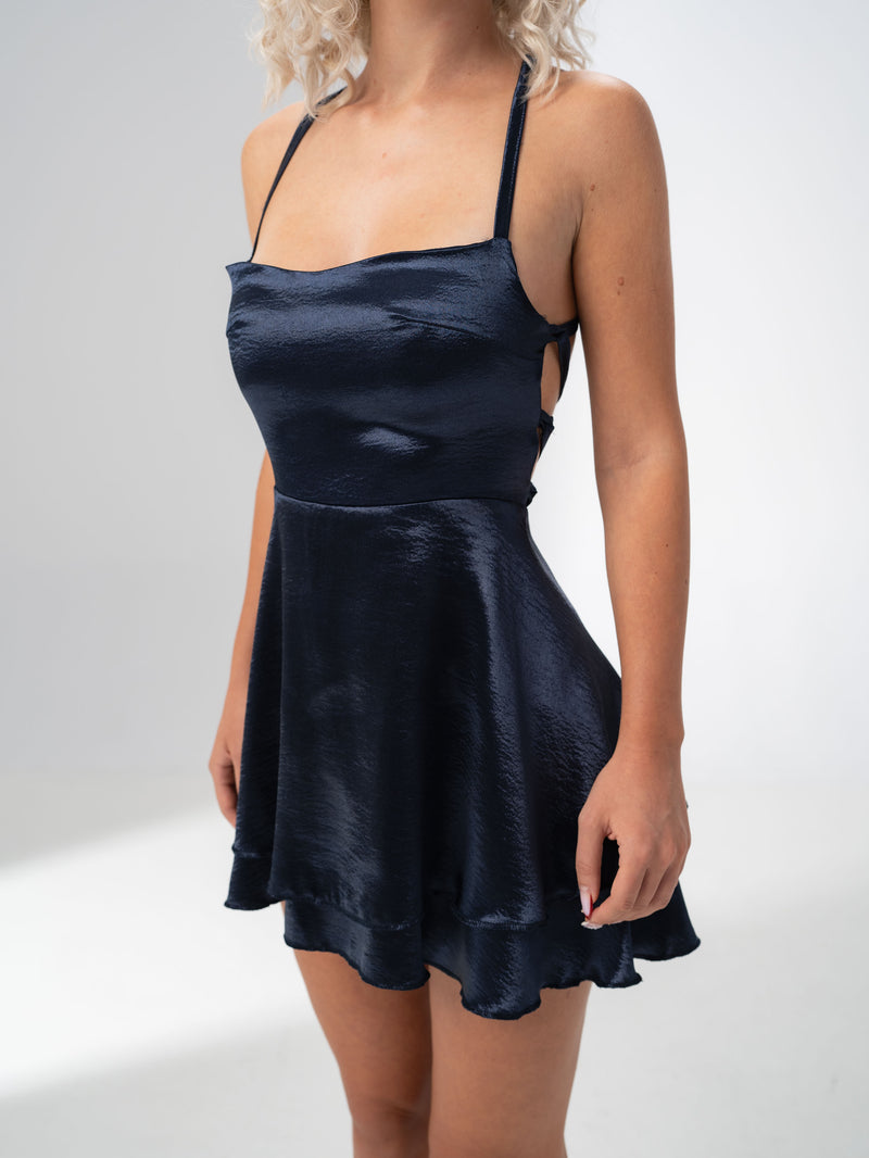 Girl Code navy satin backless mini dress with crossed harness straps at the back