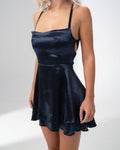 Girl Code navy satin backless mini dress with crossed harness straps at the back