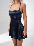 Girl Code navy satin backless mini dress with crossed harness straps at the back