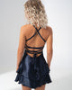 Girl Code navy satin backless mini dress with a two layer ruffled skirt