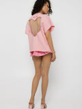 Heart shaped back cutout in crystal tulle on the pink Girl Code oversized t-shirt