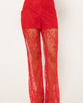 Full length wide palazzo leg of the Girl Code red lace-up pants