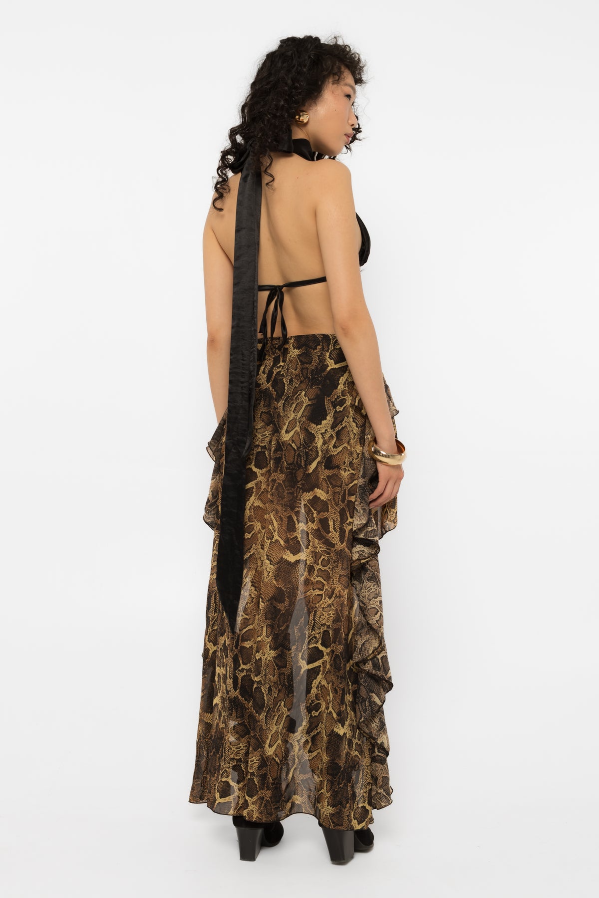 Mini front of the snake print high-low skirt over black elastic lining