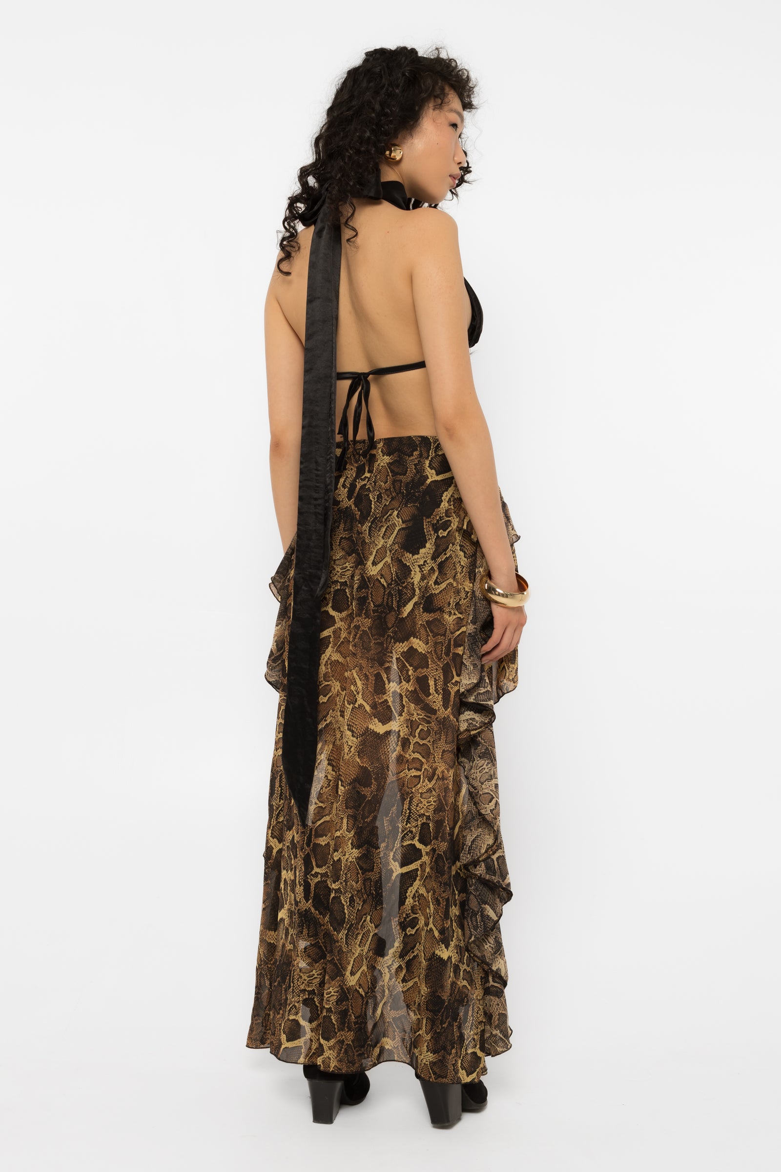 Mini front of the snake print high-low skirt over black elastic lining