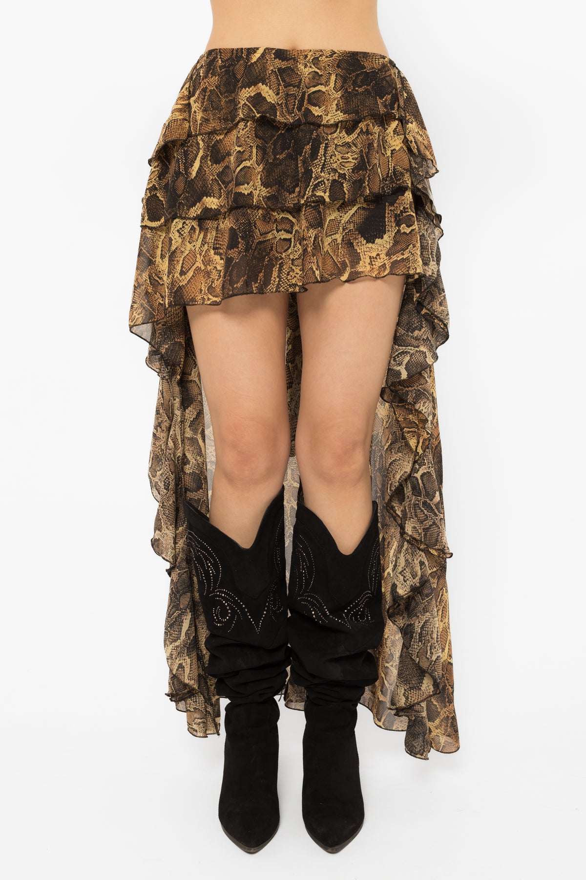 Floor sweeping ruffled back train of the sheer snake print skirt