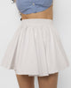 High flat waistband of the Girl Code white cotton mini skirt