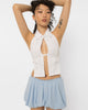 Model wearing Girl Code white cotton shirt halter top with keyhole cutout