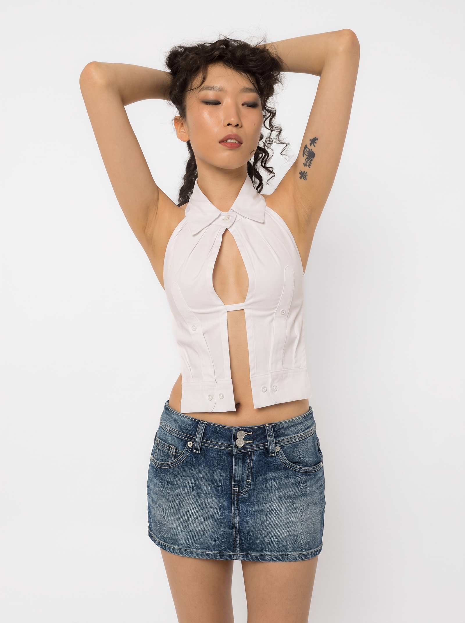 Model wearing Girl Code white cotton shirt halter top, full length front view
