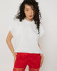 Red crystal tulle heart cutout across the back of the white oversized t-shirt