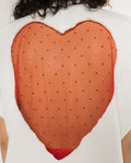 White oversized t-shirt with raw cut edges and wide dropped sleeves
