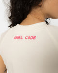 Back of the Girl Code white pierced cutout sleeveless top with tonal Girl Code logo at the neck